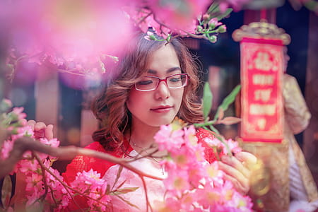 Photo of Woman Near Flowers thumbnail