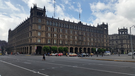 low angle photography of brown building at daytime thumbnail