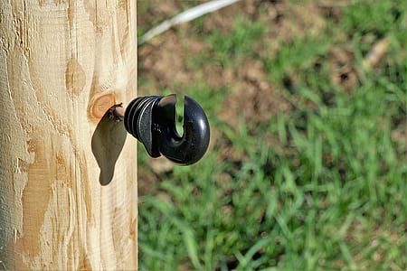 black metal hook on wood thumbnail