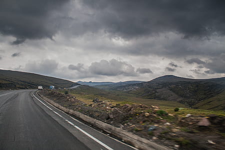 Road Near Brown Stone during Cloudy thumbnail