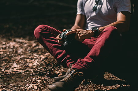 man holding camera thumbnail