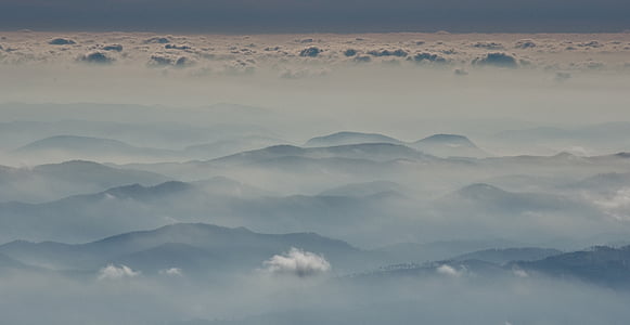 aerial photography of mountain range with fogs thumbnail