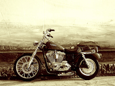 sepia photo of cruiser motorcycle thumbnail