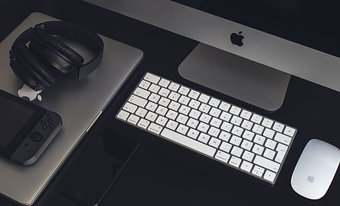 silver iMac turned off in front of Apple Magic Keyboard and Magic Mouse thumbnail