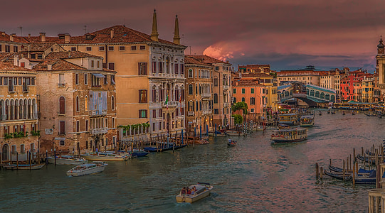 high angle photo of city buildings near body of water thumbnail