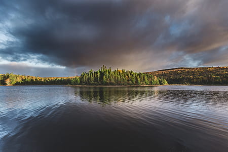 landscape photo of body of water and island thumbnail