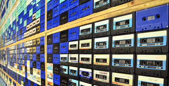 selective focus photography of organized cassette tapes thumbnail