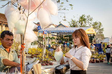 woman about to buy cotton candy thumbnail
