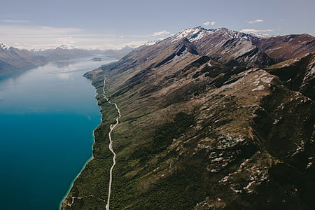 aerial view of mountain beside river thumbnail