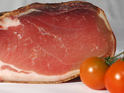 raw meat near cherry tomatoes thumbnail