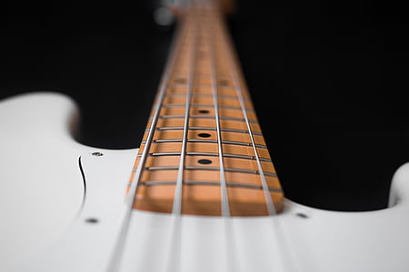 white and brown bass guitar thumbnail