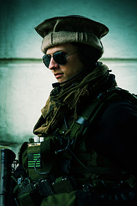man holding rifle wallpaper thumbnail