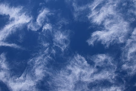 white cirrus clouds on blue sky during daytime thumbnail