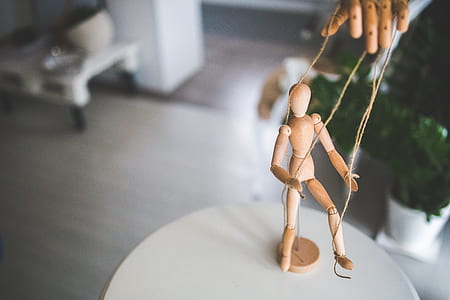 brown string puppet thumbnail