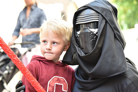 man with Star Wars Kylo Ren costume holding a boy thumbnail