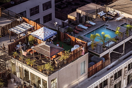 high-angle photography of outdoor pool on rooftop thumbnail