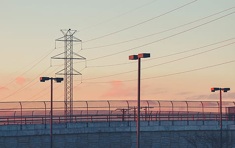gray electric pole during golden hour thumbnail