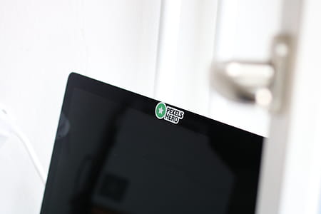 Closeup Photo of Opened Black Laptop Computer With Pexels Hero Sticker thumbnail