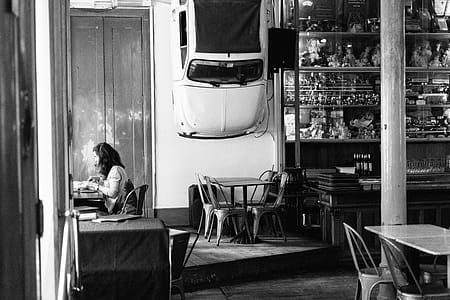 Grayscale Photo of Woman Sitting thumbnail