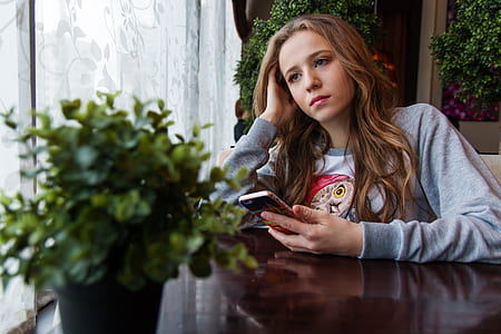 woman wearing gray jacket thumbnail