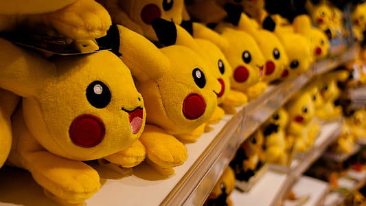 Pokemon Pikachu plush toys on shelf thumbnail