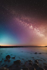 starry skies over water shoal thumbnail