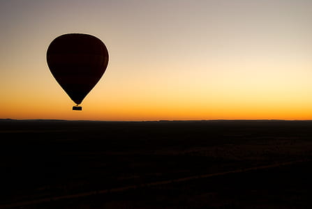 photo of hot air balloon during sunset thumbnail