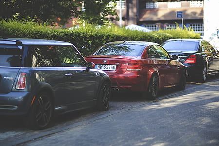 Cars parked along way thumbnail