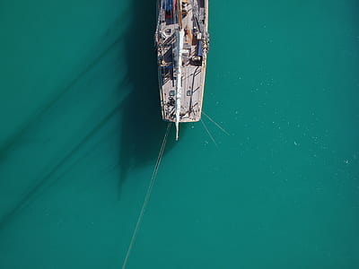 aerial photography of boat on body of water thumbnail