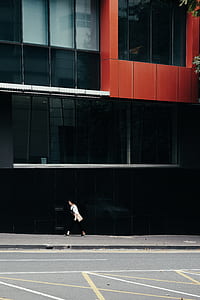 woman walking on roadside thumbnail