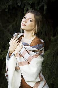 woman wearing white and brown tops thumbnail
