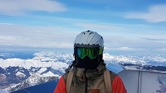 man wearing white helmet standing thumbnail