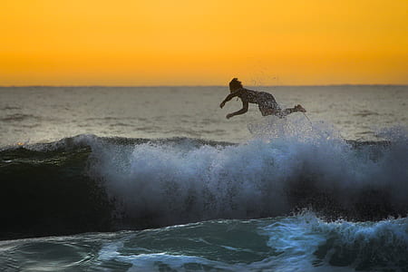 man jumping on water wave thumbnail