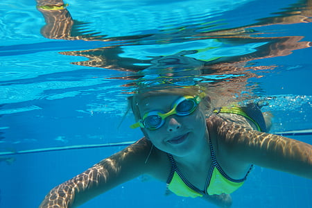 girl swimming in water thumbnail