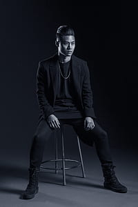 man sitting on chair thumbnail