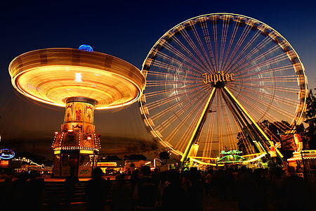 brown and black ferris wheel during nightime thumbnail