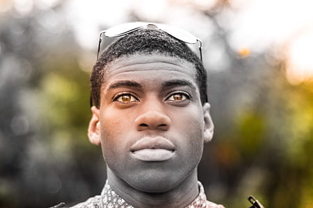 man with collared shirt posing for a photo thumbnail