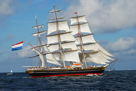 white, black, and red galleon ship thumbnail