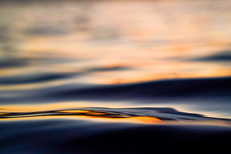 selective focus of water during daytime thumbnail