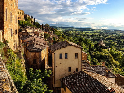 town on mountain with green trees thumbnail