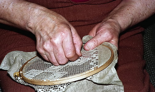man holding gray frame thumbnail