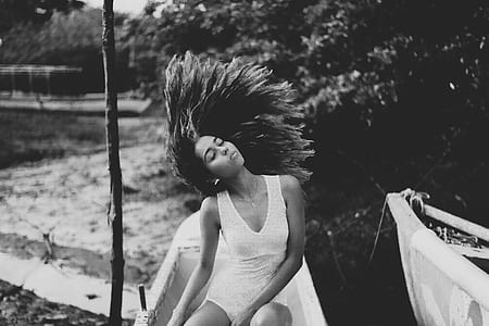 woman sitting on gray boat thumbnail