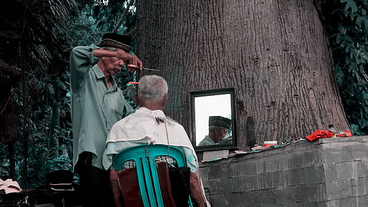 man sitting on chair thumbnail