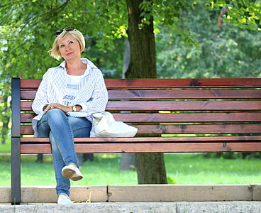 woman sitting on bench thumbnail