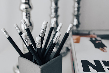 Pencils, magazines and an old lightbulb thumbnail