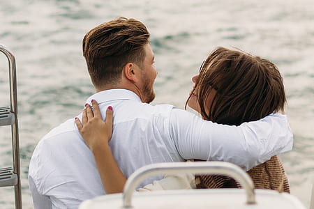 man and woman on boat during daytime thumbnail