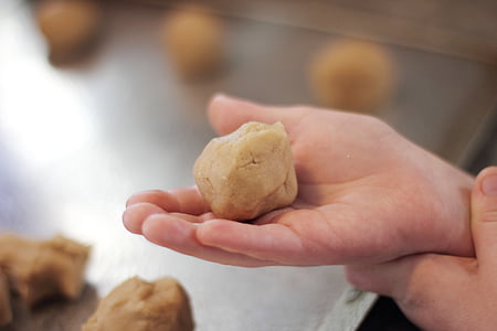 person holds dough thumbnail