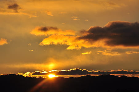 Silhouette of Mountains during Sunset thumbnail