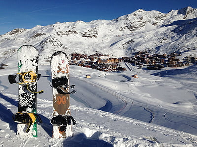 brown and black snowboards thumbnail