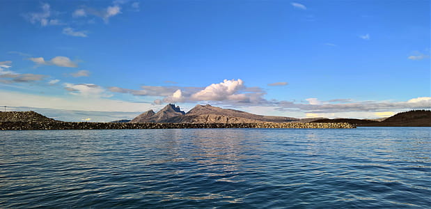 Landscape Photography of Mountain Near Body of Water thumbnail